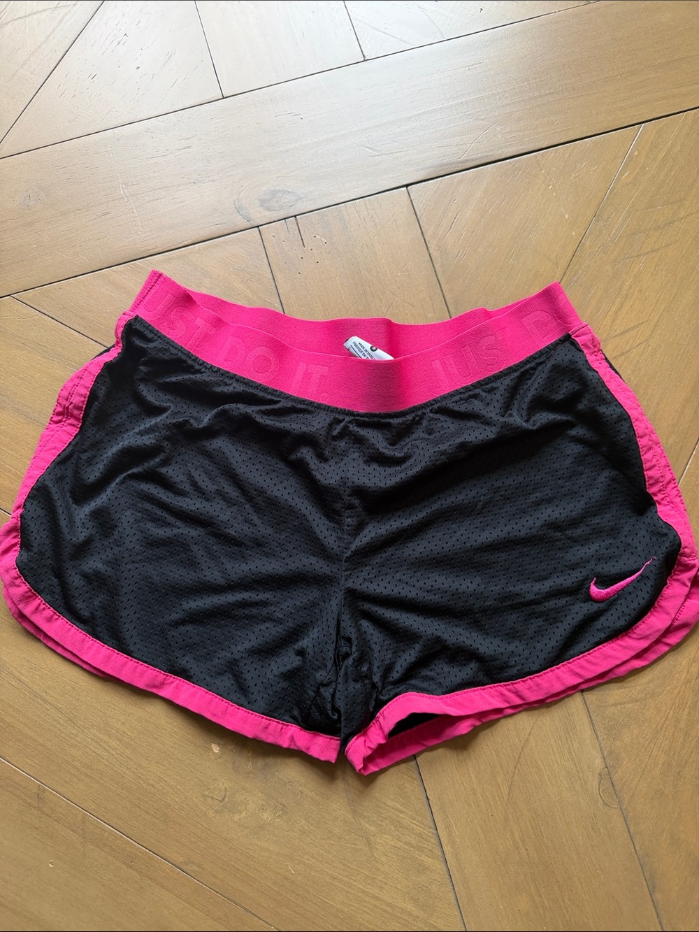 Nike Women's Black Athletic Shorts with Hot Pink Trim